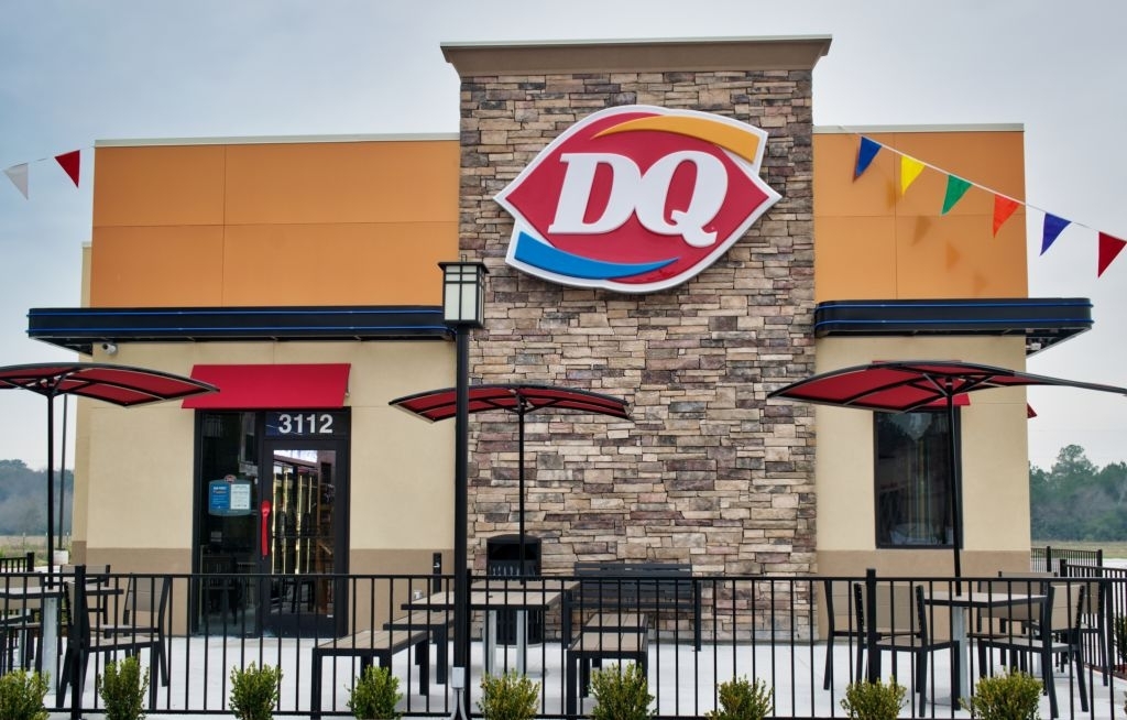 Dairy Queen Franchise storefront. Fast food chain store selling hot food and ice cream.